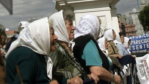  Madres and Abuelas de Plaza de Mayo participate in “Resistance March” in Buenos Aires for the 25 anniversary of the trial against the military junta, Dec. 9, 2010. 