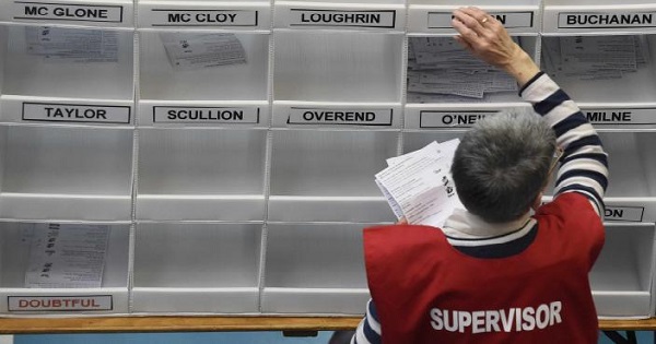 Tellers sorts ballots in the Northern Ireland assembly elections, in Ballymena, Northern Ireland March 3, 2017.
