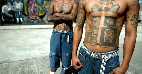 Members of the Barrio 18 gang show their tattoos in the National Penitentiary in Tamara, near the Honduran capital of Tegucigalpa.