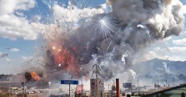 A massive explosion guts Mexico's biggest fireworks market in Tultepec, outside Mexico City, Dec. 20, 2016.