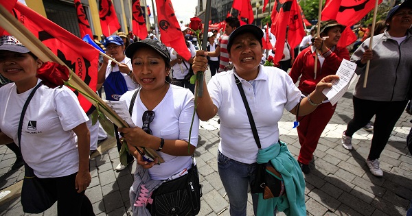 Ecuadorean women march with unions on International Workers' Day in the capital city Quito, May 1, 2016.