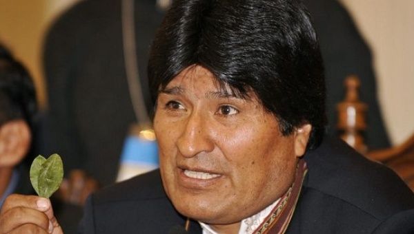 Bolivian President Evo Morales holding coca leaves.