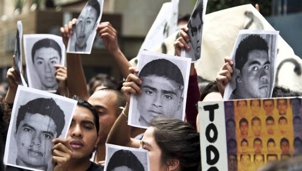 Activists demanding the return of 43 missing students from the Ayotzinapa teachers' college