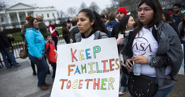 Immigrant rights group marches in front of the White House, Dec. 30, 2015.