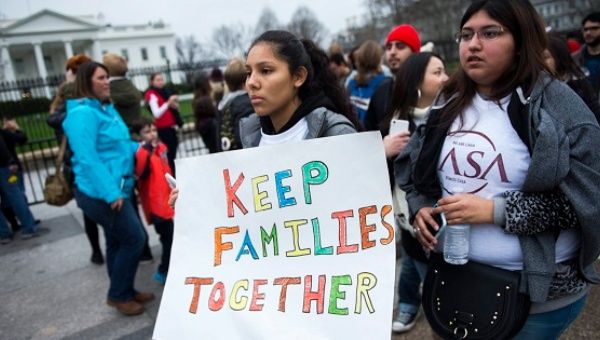 Immigrant rights group marches in front of the White House, Dec. 30, 2015.