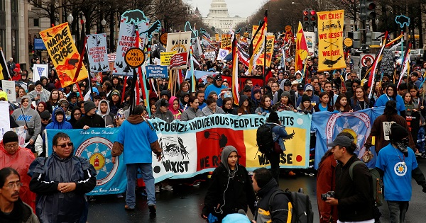 Indigenous leaders participate in a protest march and rally in opposition to the Dakota Access and Keystone XL pipelines.