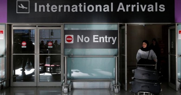 An international traveler arrives after U.S. President Donald Trump's executive order travel ban at Logan Airport in Boston, Massachusetts, U.S. Jan. 30, 2017.