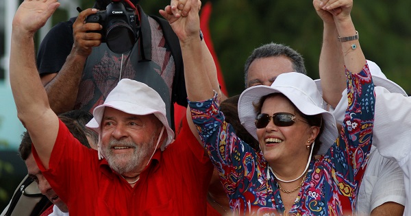 Former Brazilian presidents Luiz Inacio Lula da Silva (L) and Dilma Rousseff wave to supporters in Monteiro, Paraiba state, Brazil, March 19, 2017.