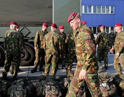 Dutch soldiers, part of the flash power military unit, a rapid intervention force which also includes Germany and Norway, prepare for an international military alert exercise at the NATO airbase.