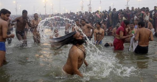 Hindu devotees take dip during the first “Shahi Snan” (grand bath) at the ongoing “Kumbh Mela”, or Pitcher Festival, in the city of Allahabad Jan.14, 2013.