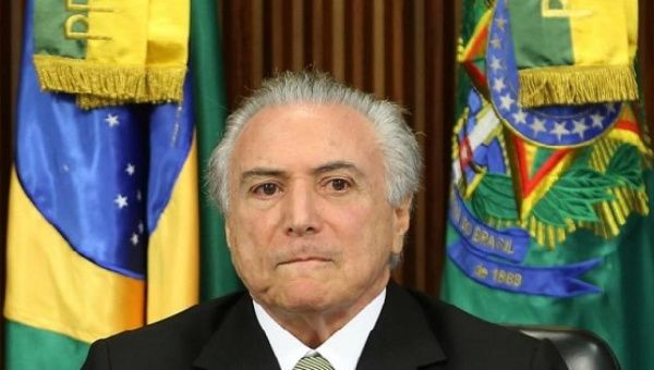 Brazil's interim President Michel Temer reacts during a meeting of the presentation of economic measures, at the Planalto Palace in Brasilia, Brazil, May 24, 2016. 