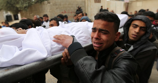 Mourners carry the body of Palestinian Youssef Abu Azra during his funeral in Rafah in the southern Gaza Strip.