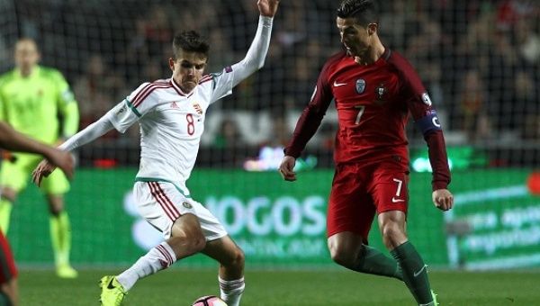 Hungary's Adam Nagy in action with Portugal's Cristiano Ronaldo