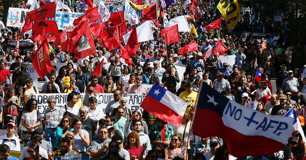 Demonstrators take part in a protest against the pension system in Valparaiso, Chile.