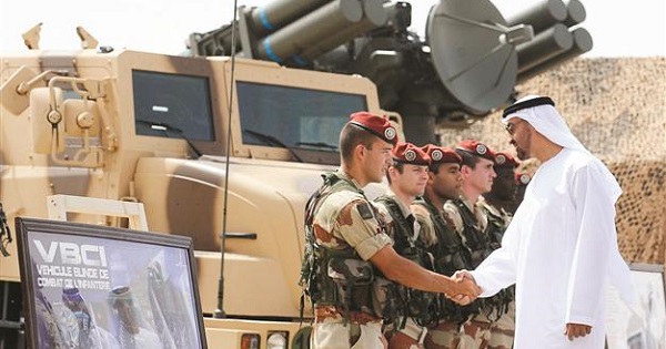 UAE Crown Prince Al Nahyan shakes hands with France’s armed forces.