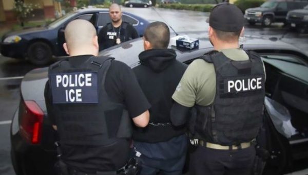 Reportedly an occupant of the house is wanted on weapons charges but ICE decline confirm.