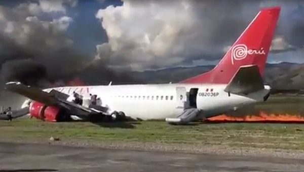 Peruvian Airliner plane on fire after landing. 