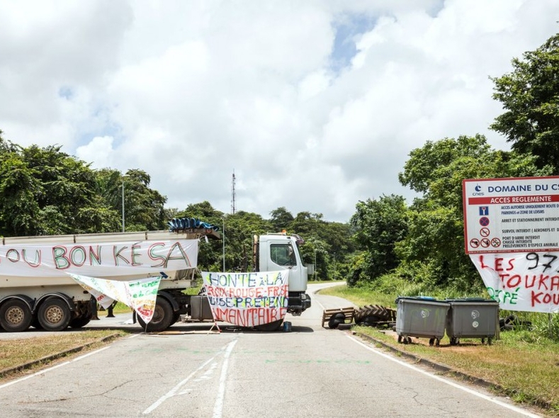 In the Kourou commune, protesters set up road blocks to stop cars passing into the center.