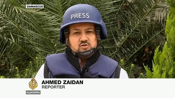 Ahmad Zaidan, Al Jazeera's Islamabad bureau chief, is shown here reporting from Damascus, Syria.