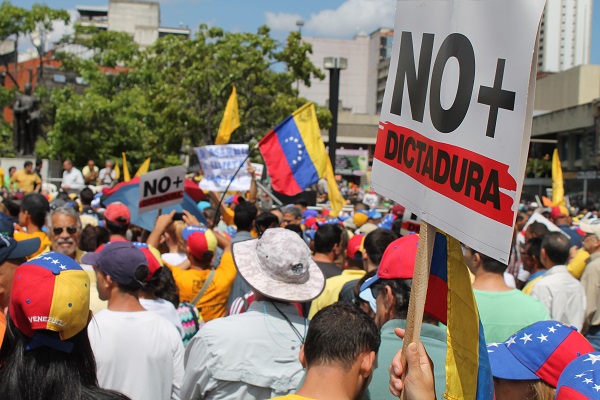 Opposition supporters echo their leaders declaration that the Venezuelan government is now 