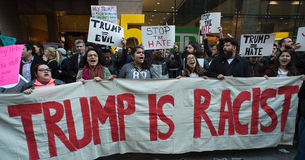 Protesters gather near Grand Central Station to protest against then Republican presidential candidate Donald Trump, April 14, 2014 in New York.