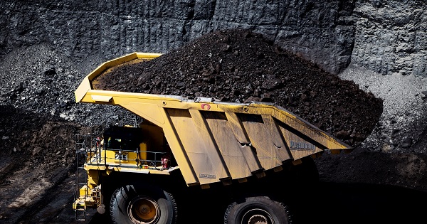 Haul trucks move coal as seen during a tour of Peabody Energy's North Antelope Rochelle coal mine near Gillette, Wyoming, U.S. on June 1, 2016.