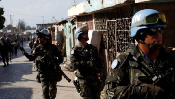 U.N. peacekeepers patrol the neighborhood of Cite Soleil together with Haitian national police officers and members of UNPOL in Port-au-Prince, Haiti, March 3, 2017. 
