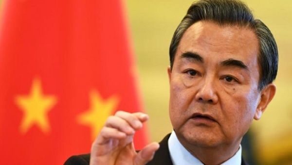Chinese Foreign Minister Wang Yi speaks during a press conference in Beijing, China Dec. 5, 2016.