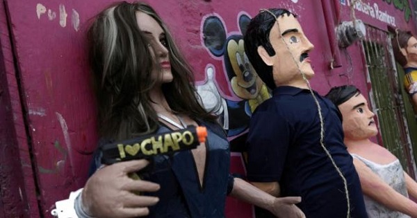 Pinatas depicting Mexican actress Kate del Castillo (L) and the drug lord Joaquin ''El Chapo'' Guzman are displayed outside a workshop in Reynosa, in Tamaulipas state, Mexico, January 13, 2016.