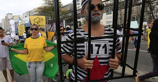 Protesters on the streets of Copacabana Beach boulevard calling for the end of corruption, in Copacabana, Rio de Janeiro, Brazil, July 31, 2016.