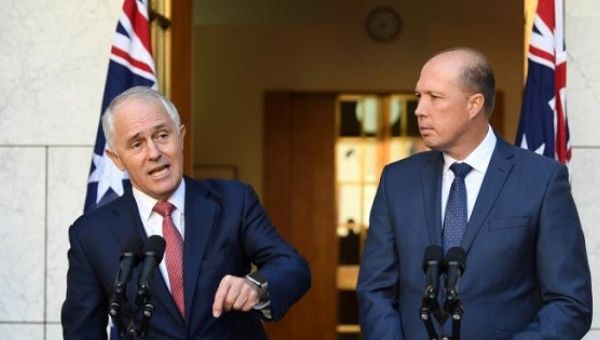 Australia's Prime Minister Malcolm Turnbull (L) and Minister for Immigration and Border Protection Peter Dutton speak on Australia's citizenship test during a press conference in Canberra, Australia, April 20, 2017. 