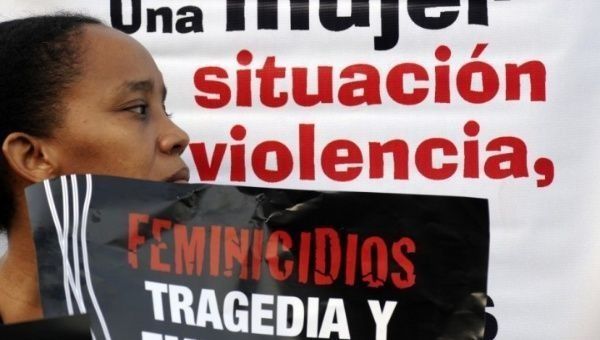 A woman protests against femicide in Latin America. 