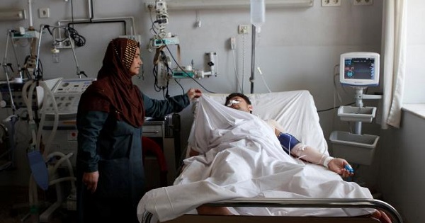 An Afghan national Army (ANA) soldier receives treatment at a hospital a day after a attack on an army headquarters in Mazar-i-Sharif northern Afghanistan April 22, 2017.