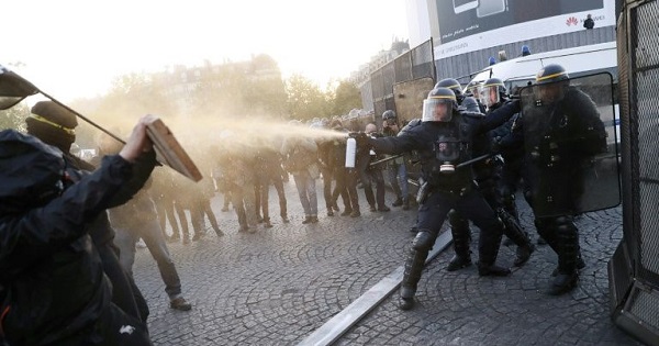 Police attack anti-fascist demonstrators in Paris after the first round of voting in France’s presidential elections.