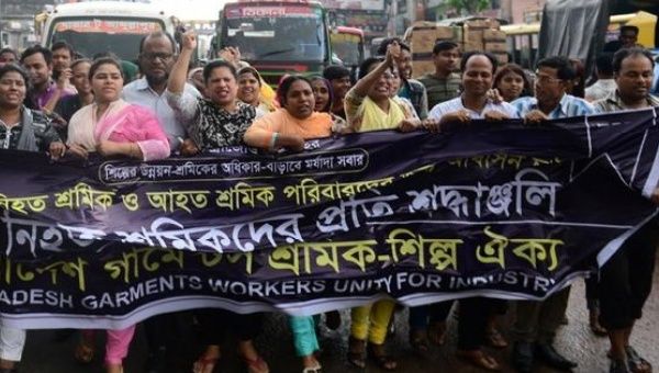 Bangladeshi activists mark the fourth anniversary of the Rana Plaza building collapse. 