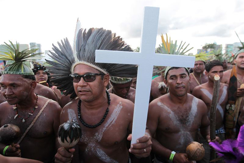 Brazilian Indigenous people take part in a demonstration against the violation of Indigenous people's rights, in Brasilia, Brazil, April 25, 2017.