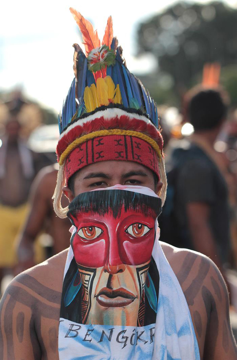 Brazilian Indigenous people take part in a demonstration against the violation of Indigenous people's rights, in Brasilia, Brazil, April 25, 2017.