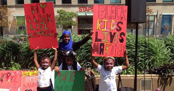 People demonstrate in a rally organized by BLM-TO last summer.