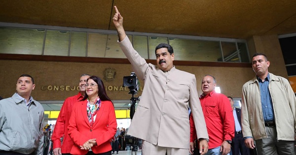 President Nicolas Maduro addresses supporter outside the National Electoral Council after filing documents for the constituent assembly.