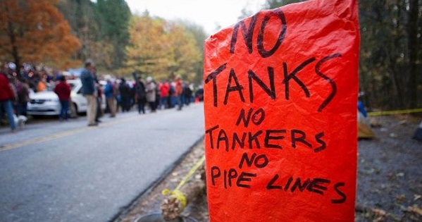 An anti-oil tanker sign is pictured near a demonstration against the proposed Kinder Morgan pipeline on Burnaby Mountain.