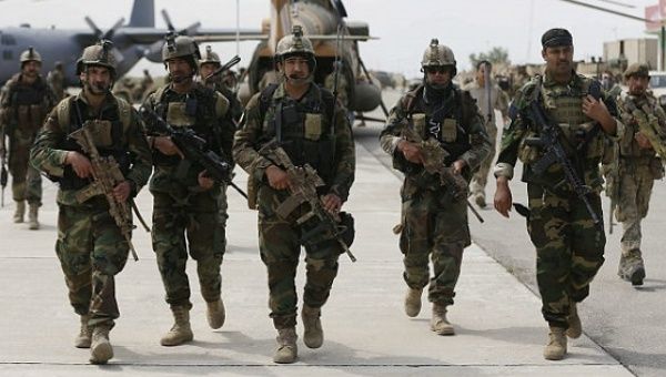 Afghan security forces arrive at the Kunduz airport in Afghanistan on Apr. 30, 2015.
