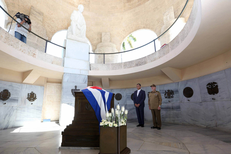The Ecuadorean president left white roses in the tomb of Jose Marti, Cuba's leading independence figure.