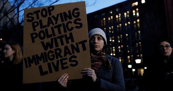 Danielle Frank holds a sign as demonstrators gather at Washington Square Park to protest against U.S. President Donald Trump in New York, U.S., January 25, 2017.
