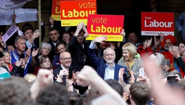 Jeremy Corbyn, the leader of Britain's opposition Labour Party, campaigns outside Leamington Spa Town Hall.
