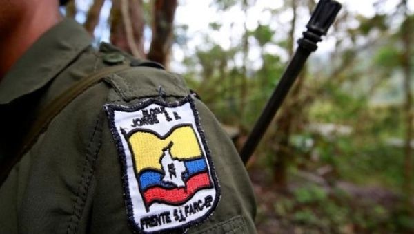 A member of the Revolutionary Armed Forces of Colombia is seen at a camp in Cordillera Oriental, Colombia, August 16, 2016.