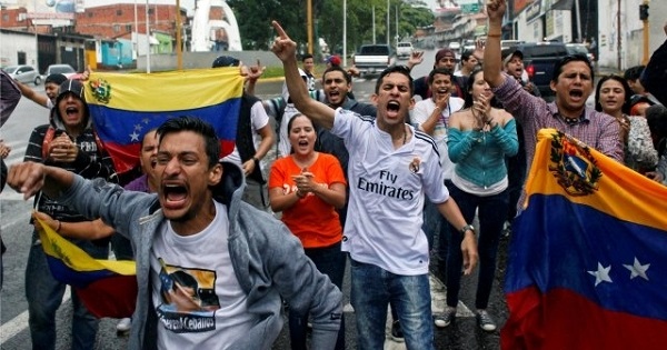Venezuelan opposition protesters demonstrate against the administration of President Nicolas Maduro.