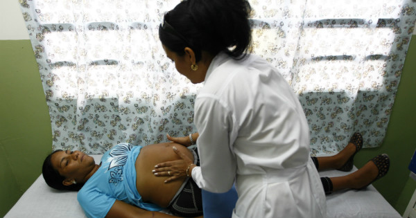Pateint being treated at a public health facility in Caracas.