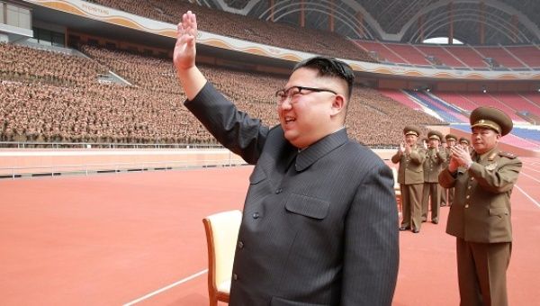 North Korean leader Kim Jong-un waves to the members of the Korean People's Army in this undated photo released on May 13, 2017. 