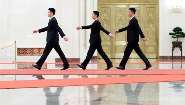 Security personnel walk inside the Great Hall of the People before the meeting between Malaysian Prime Minister Najib Razak and Chinese President Xi Jinping, ahead of the Belt and Road Forum in Beijing, China on May 13, 2017.