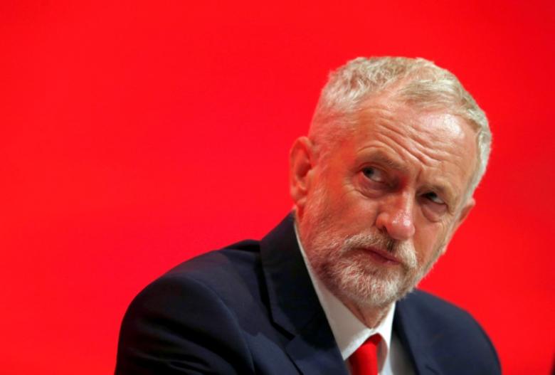 The Leader of Britain's opposition Labour Party, Jeremy Corbyn, listens to a speech on the first day of the Labour Party conference, in Liverpool, Britain.